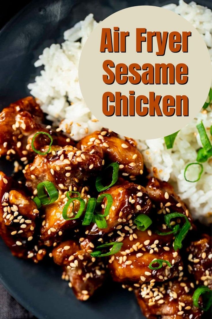 an air fryer sesame chicken on a plate with rice