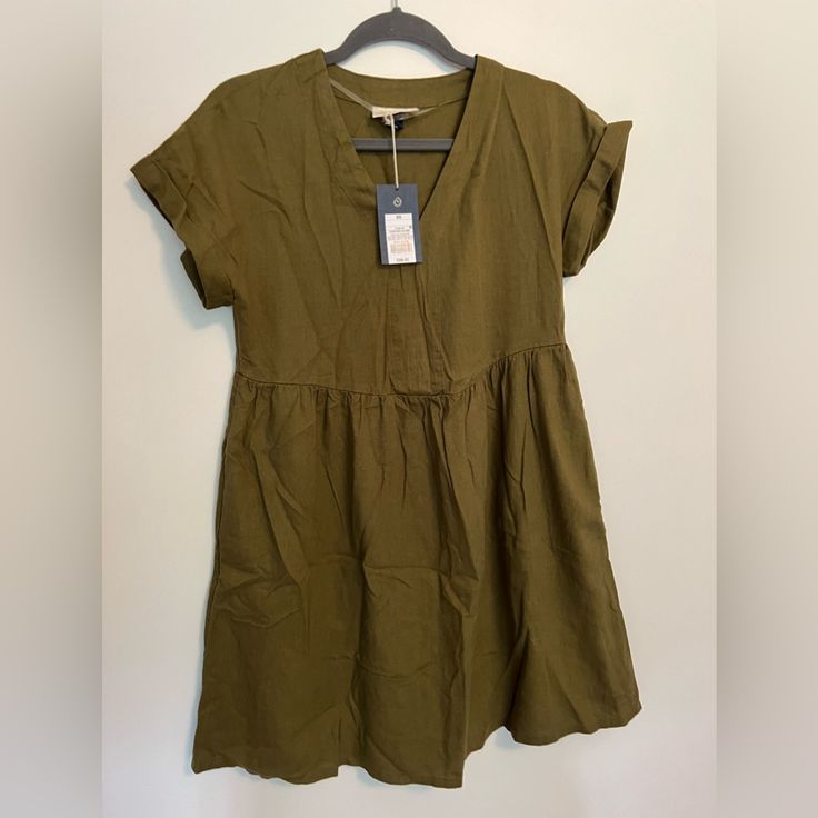 Pretty Olive Color Cotton V-neck Mini Dress, Green Relaxed Fit Mini Dress, Casual Cotton Sundress With Short Sleeves, Olive Summer Dress For Daywear, Olive Fitted Casual Dress, Fitted Olive Casual Dress, Casual Fitted Olive Dress, Olive Dress For Summer Daywear, Spring Mini Dress In Relaxed Fit