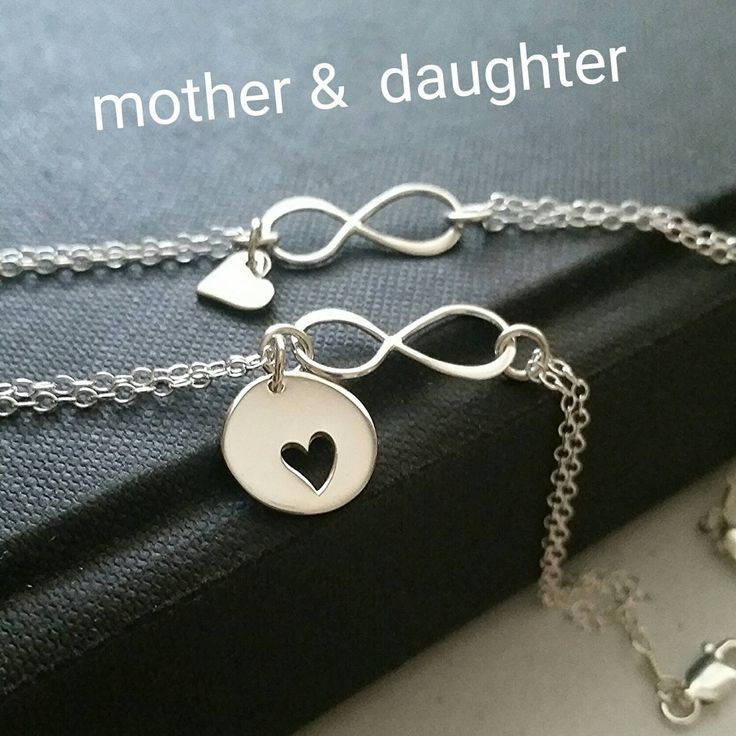 Mother and daughter infinity bracelets sets available in golden bronze or sterling silver. Two bracelets featuring a cut out heart disc for mother and tiny heart charms for daughters. small heart charm bracelet 6-7'' Cutout heart charm bracelet 6.5-7.5'' *Please let me know if you need diff. chain length. no extra fee up to 8'' *rose gold version is made of rose gold filled chain, rose gold plated charms Mother Daughter Bracelet Set, Infinity Bracelets, Mother Daughter Jewelry, Mother Daughter Bracelets, Mom Wedding Gift, Mother Daughter Gifts, Wedding Day Gifts, Daughter Jewelry, Mum Birthday Gift