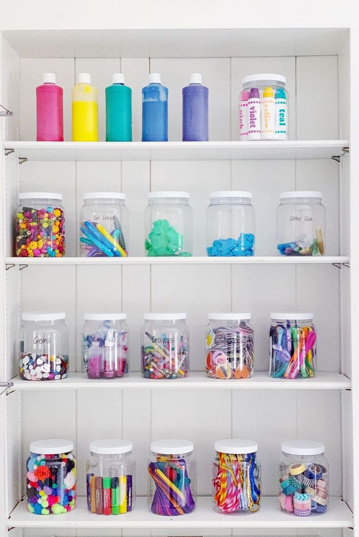 the shelves are filled with different types of craft supplies