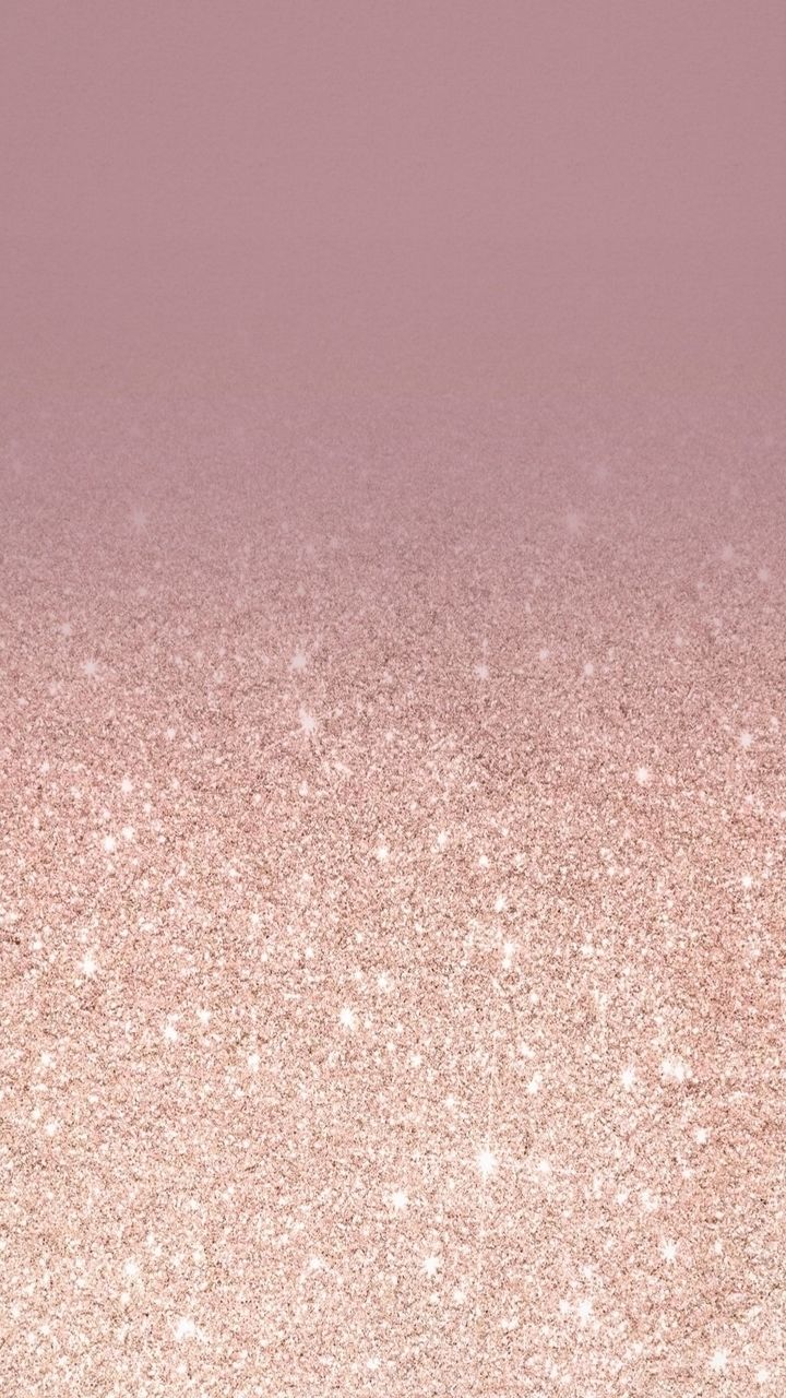 a pink background with small white stars on the left and right side of the screen