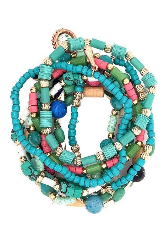 Elevate your style game with our Caribbean Multi-strand Beaded Bracelet. Hand-crafted from beautiful, vibrant beads, this bracelet will add a touch of island paradise to any outfit. The multi-strand design adds dimension and texture, perfect for any fashion-forward individual. Experience the beauty and craftsmanship of the Caribbean in one stunning piece. Approximate measurements: Diameter 2.5" Multi-strand Colorful Beads Friendship Bracelets For Beach, Turquoise Faceted Beads Bracelets For Beach, Turquoise Multi-strand Bracelets With Colorful Beads, Turquoise Multi-strand Bracelet With Colorful Beads, Bohemian Multi-strand Bracelets For Beach, Green Multi-strand Bracelet With Colorful Beads, Adjustable Multi-strand Bracelets For Summer, Multicolor Multi-strand Friendship Bracelets For Beach, Multicolor Multi-strand Beaded Bracelets For Beach