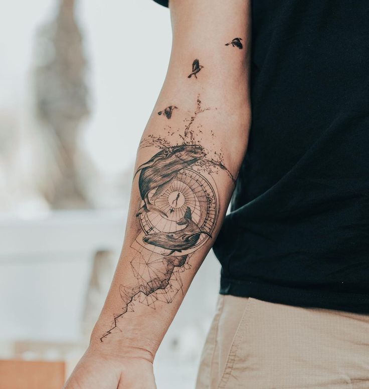 a man with a clock tattoo on his arm