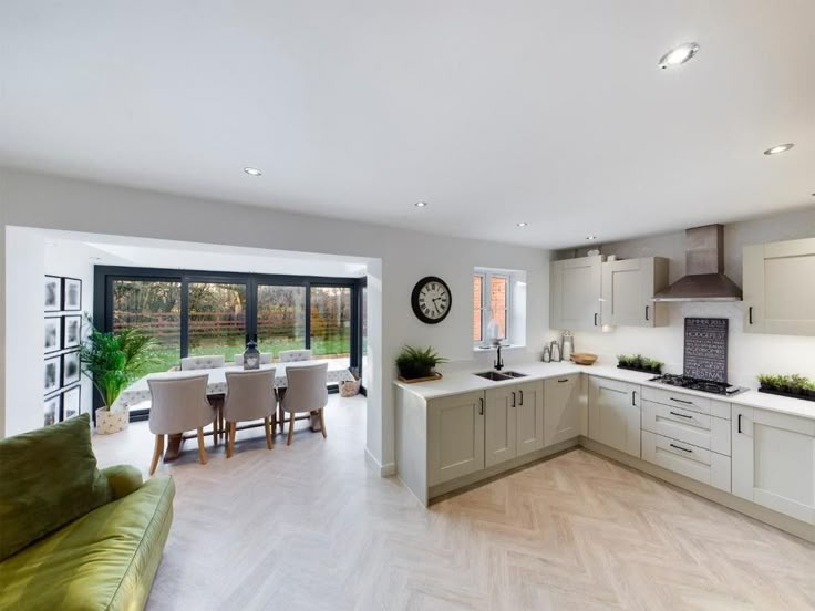 a large open kitchen and dining room area