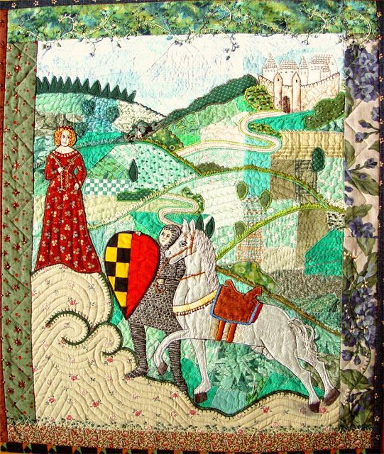 a quilted wall hanging with an image of a knight riding a horse