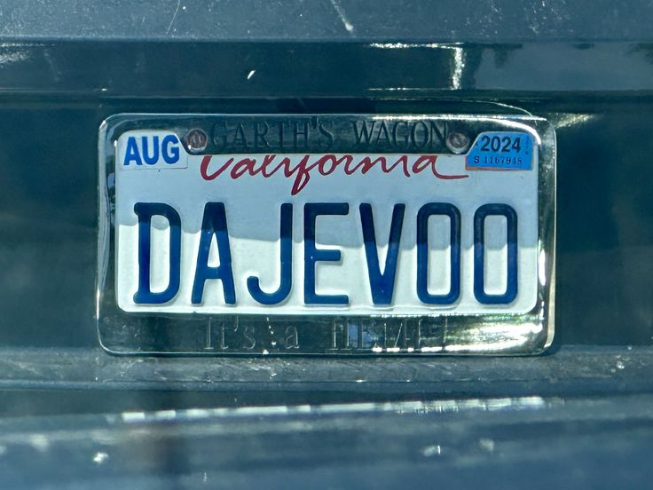 a close up of a license plate on a car