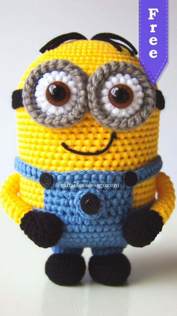 a yellow and blue minion with big eyes