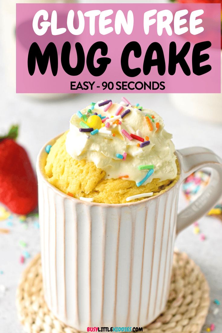 gluten free mug cake with whipped cream and sprinkles on top