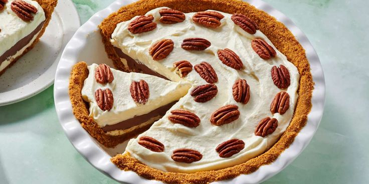 there is a pie with pecans on it