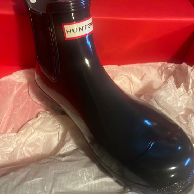 Hunter Boots Women Size 11 Black Slip-on Waterproof Boots, Black Waterproof Slip-on Boots, Black Ankle-high Waterproof Rain Boots, Black Waterproof Ankle-high Rain Boots, Black Waterproof Rain Boots, Black Waterproof Closed Toe Rain Boots, Black Ankle-high Rain Boots For Winter, Black Boots With Cushioned Footbed And Flat Heel, Casual Black Ankle-high Rain Boots