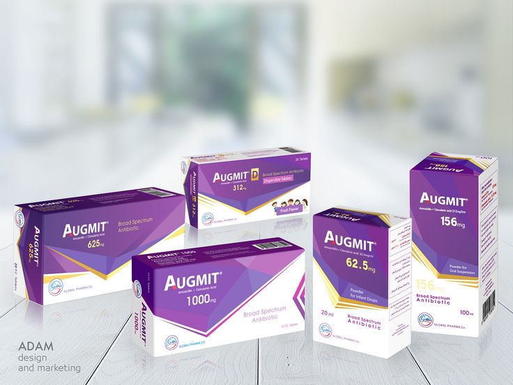 three boxes of augumit are sitting on the floor in front of a white background