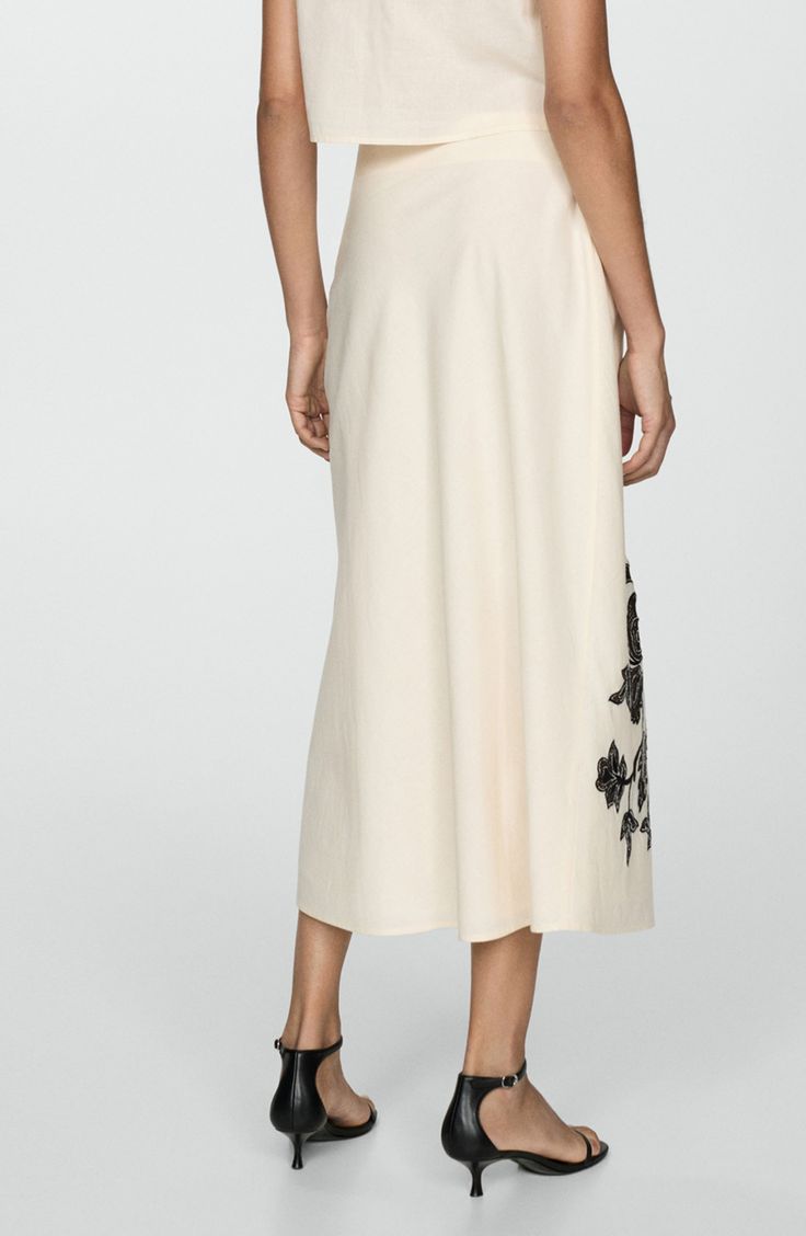 A cotton and linen fabrication adds lightweight charm to this A-line midi skirt detailed with charming floral print twining its way up one side. Concealed-elastic waist Cotton lining 90% cotton, 10% linen Machine wash, line dry Imported Elegant Embroidered Bottoms For Spring, Elegant Embroidered Spring Bottoms, Elegant Floral Embroidered Summer Bottoms, Feminine Cotton Skirt For Brunch, Elegant Cotton Maxi Skirt For Spring, Elegant Cotton Maxi Skirt For Summer, Long Cotton Skirt For Brunch, Flowy Floral Embroidered Maxi Skirt For Summer, Elegant Cotton Skirt For Brunch