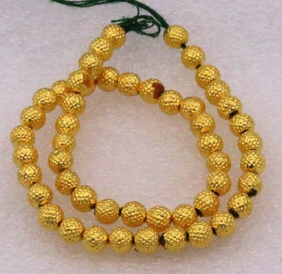 Lot of 50 pieces Vintage handmade 20kt yellow gold beads ball for excellent jewelry making idea trib Traditional Beads For Jewelry Making And Festivals, Gold Gemstone Beads Jewelry For Diwali, Gold Oval Polished Beads, Diwali Gemstone Round Beads Jewelry, Diwali Gold Gemstone Bead Jewelry, Traditional Handmade Gold Beads, Gold Temple Jewelry Beads For Festive Occasions, Diwali Jewelry With Round Gemstone Beads, Diwali Gold Jewelry With Gemstone Beads