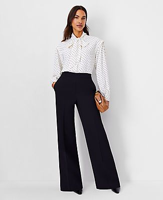 Elevate your wardrobe with the Ann Taylor Petite Wide Leg Pant in Fluid Crepe, a testament to modern elegance and comfort. These pants are designed to flatter with a high-rise waist and a flowing wide-leg silhouette that adds a touch of sophistication to any outfit.

- **Size:** Petite 12
- **Color:** Black
- **Material:** 95% Polyester, 5% Spandex
- **Fit:** Relaxed and easy
- **Length:** Full length, 30" inseam with a 22 1/2" leg opening
- **Gender:** Female
- **Closure:** Hidden side zip with Chic Executive Outfits Women, Navy Pant Suit Women, Elegant Womens Outfits, Wide Legged Black Pants, Blue And Black Work Outfit, Women’s Black Dress Pants, Wide Leg Slacks Outfit Business Casual, Dress Pants Women Outfit, High Waist Work Pants