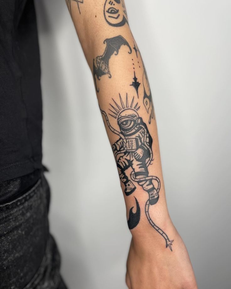 a person with a tattoo on their arm