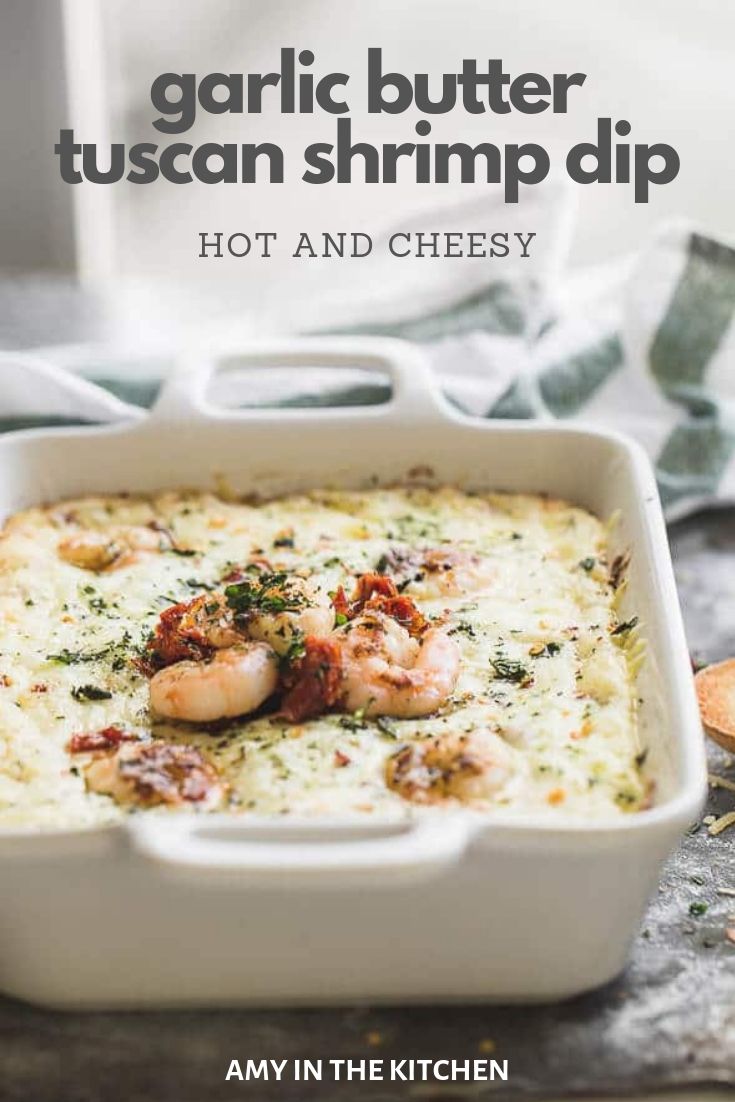 garlic butter tuscann shrimp dip in a white casserole dish with text overlay