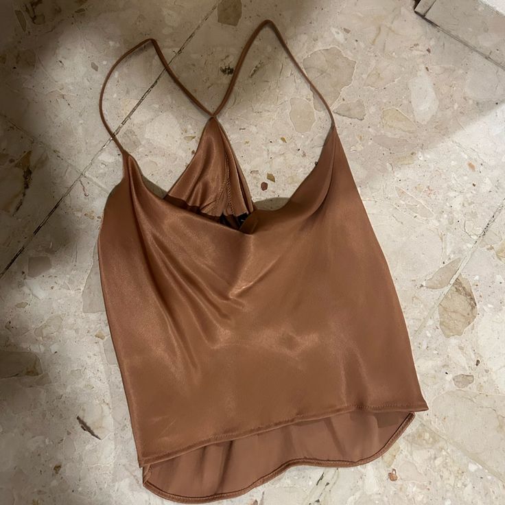 Silky, Brown/Tan Shirt. Cut Blouse For Bight Out. Not Too Long But Also Not Too Short. Never Used!! Bought A Couple Of Years Ago From Prior Collection Brown Top With Built-in Bra For Spring, Zara Cami Top For Night Out, Zara Cami Top With Built-in Bra, Trendy Zara Cami Top, Casual Brown Tops For Night Out, Brown Tops With Built-in Bra For Spring, Beige Camisole Top For Party, Chic Brown Tank Camisole, Chic Brown Cami Top