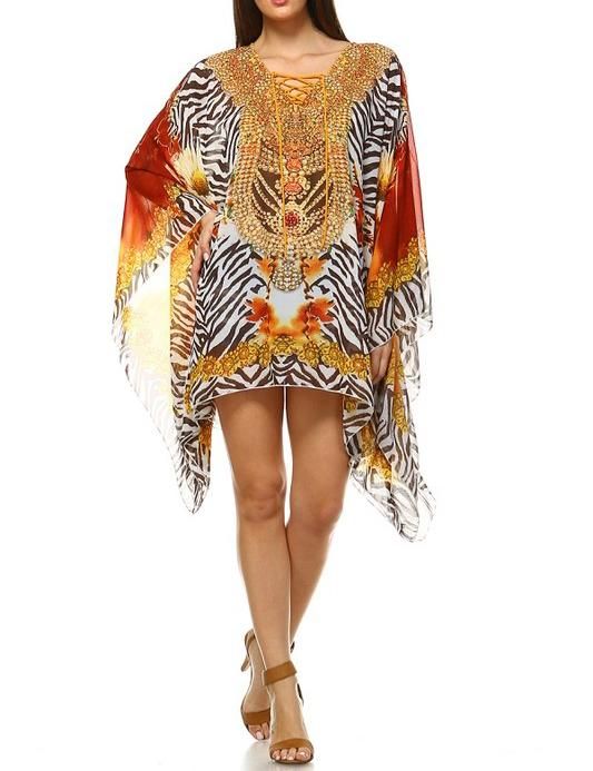 This stunning mini sheer kaftan has a collarless unlined v neckline that has a lace up in the cleavage area. Prints allover this beautiful pullover style, half cape sleeves and loose easy silhouette. Sparkle in this kaftan anywhere you go, It's perfect for a day out on the beach or to run errands. It's very fashionable, always in style and very comfortable. Length: 31 inches. Material: 55% Silk, 45% Polyester Neckline: Unlined V Neck Sleeve Style: Half Cape Sleeve Closure Style: Pullover Garment Half Cape, Sheer Kaftan, Kaftan Tops, Cape Sleeves, Beach Wears, Pullover Styling, High Low Dress, Sleeve Styles, Cape