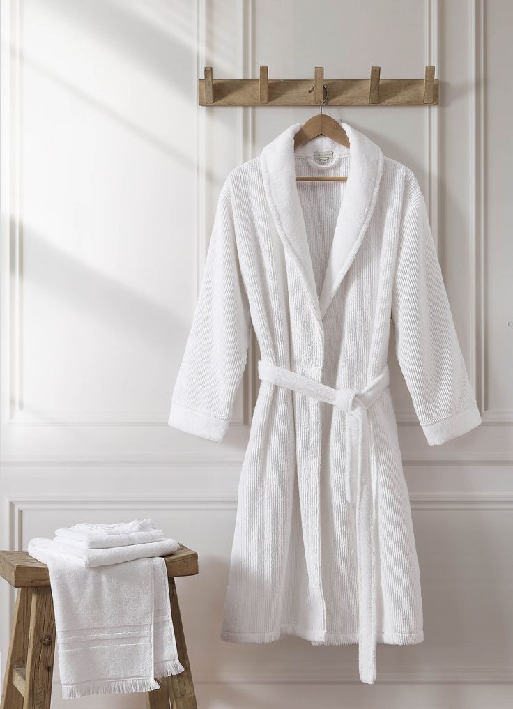 Bring the spa home with this luxurious, kimono-style robe. Featuring a chic and timeless ribbed texture for superior post-soak style, this bathrobe is made entirely from long-staple Turkish cotton for extra softness and absorbency. 100% long-staple Turkish cotton Features a tie waist Lightweight and fast-drying OEKO-TEX® Standard 100 certified Made in Turkey Cute Bathrobe Aesthetic, Bathrobes Aesthetic, Elegant White Lounging Robe, Elegant White Robe For Relaxation, White Robe Aesthetic, Bath Robe Aesthetic, Bathrobe Aesthetic, 2025 Wishlist, Spa Robes