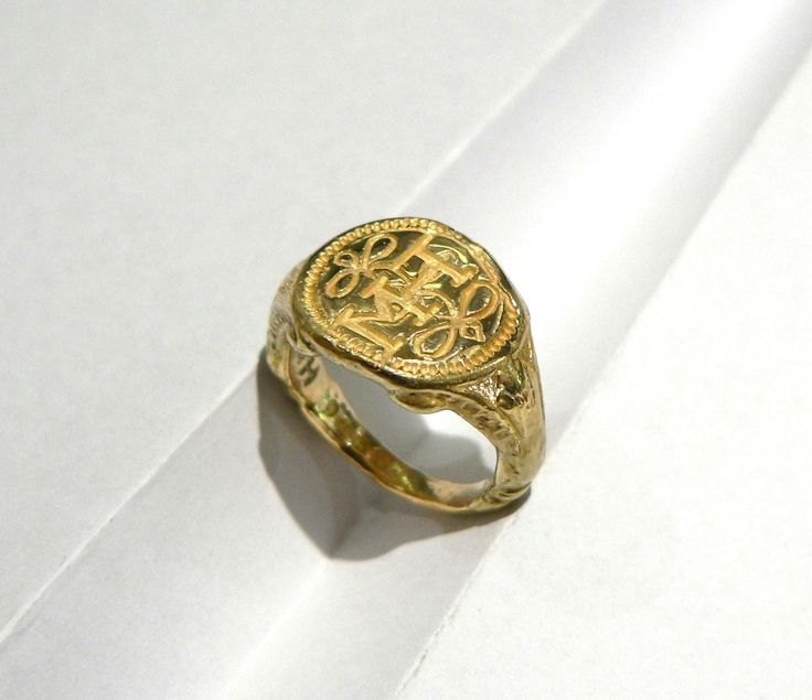 Rare solid 18 carat gold Historical ring. This stunning ring has been created from a mould taken directly from the unique original ring in the V&A Museum by my father, a renowned archaeologist at the British Museum.  Sometimes known as the Darnley Ring, it is engraved with the initials 'MH' and true lover's knot. The gold original was thought to be the betrothal ring of Mary Queen of Scots and Lord Darnley, because the engraving inside shows a crowned shield of arms, a lion rampant and 'Henri Darnley 1565'. I will size it at my Studio, free of charge. Byzantine Engraved Yellow Gold Rings, Byzantine Style Engraved Yellow Gold Ring, Byzantine Yellow Gold Engraved Rings, Formal Yellow Gold Signet Ring With Intricate Design, Victorian Style Gold Engraved Ring With Intaglio, Byzantine Style Signet Ring For Anniversary, Antique Hallmarked Gold Dome Ring, Gold Ceremonial Open Signet Ring, Gold Open Signet Ring For Ceremonial Occasions