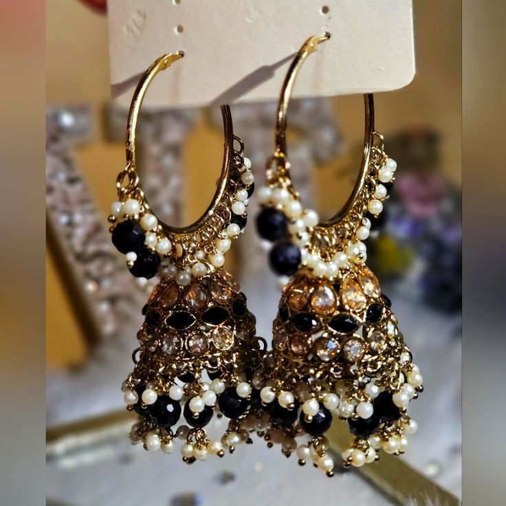 Beautiful Polkivjhumka Earrings In Black & Gold. Black Chandbali Earrings With Latkans, Festive Black Jewelry With Latkans, Festive Black Latkans Jewelry, Black Dangle Jhumkas, Festive Black Chandbali Earrings, Black Bohemian Chandbali Earrings, Bohemian Black Earrings For Festive Occasions, Black Bohemian Earrings For Festive Occasions, Black Dangle Jhumkas With Latkans