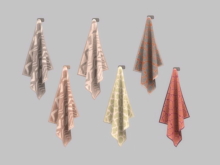 six different colored towels hanging from hooks on a gray wall, with one folded and the other unzipped