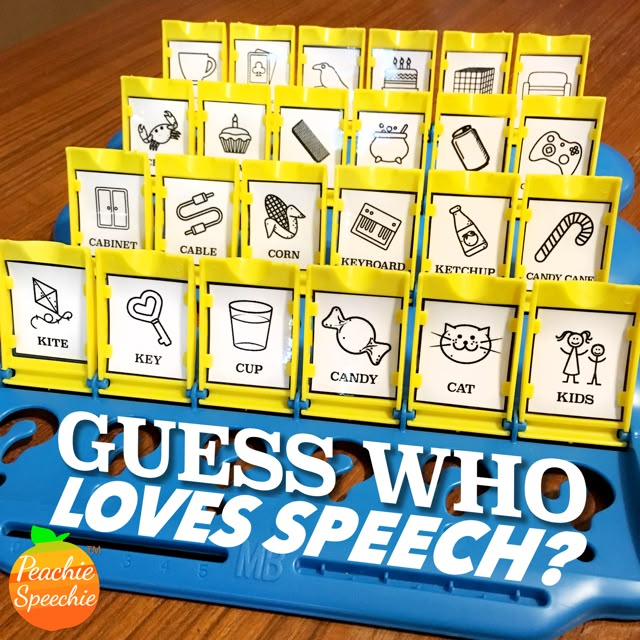 the guess who loves speech game sits on a wooden table with blue trays and yellow dividers