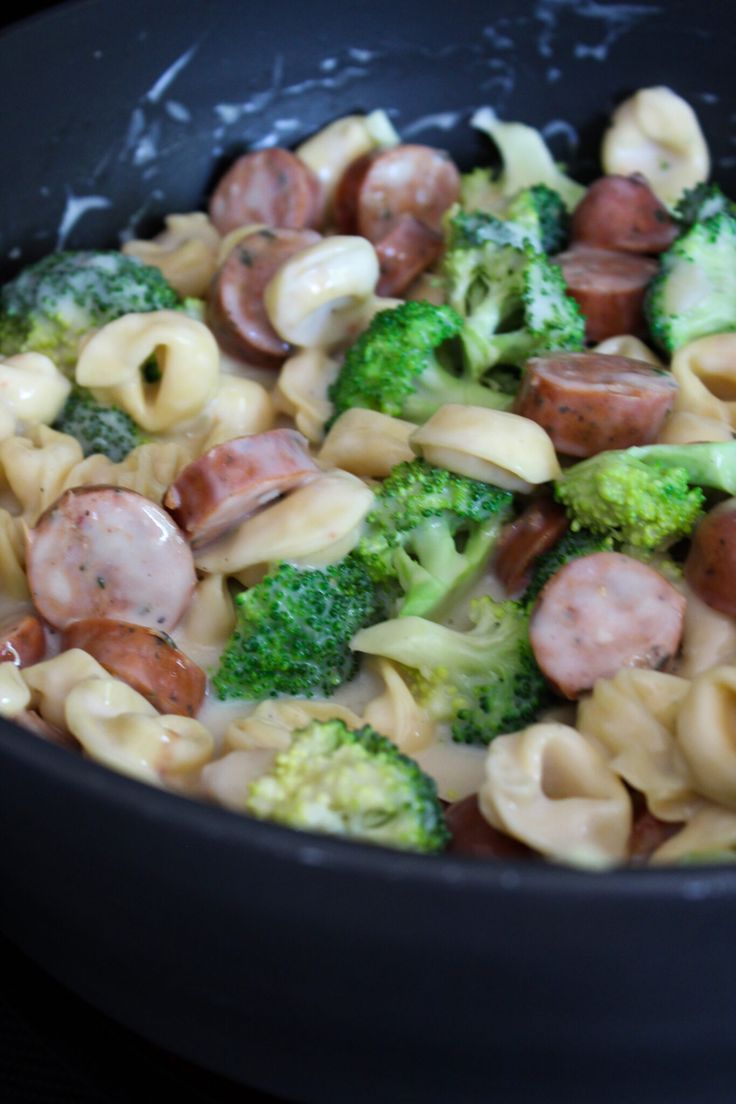 broccoli, sausage and pasta in a skillet