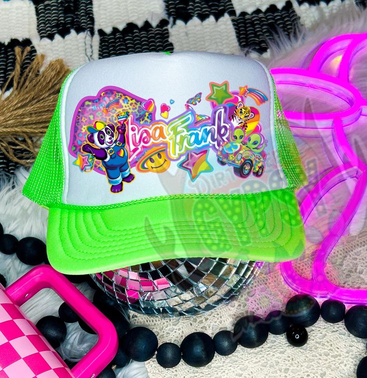 Lisa Frank Trucker Patch hats NOW AVAILABLE As much as I talked about this I really hope you guys love them. Recently I fell head over heels in love with the new over the top trucker hat trend but when I went to find myself a Lisa frank one they DID NOT EXIST 😱 So....I decided to be the one to start them. These are available in multiple colors, with or without a chain, and even sublimation or patches depending on your price range. Get yourself a premade hat or customize your own! The options ar Green Fun Snapback Trucker Hat, Fun Green Snapback Trucker Hat, Green Snapback Trucker Hat, Fun Style, Fun Green Hats With Letter Print, Fun Green Snapback Hat, Spring Fun Flat Bill Trucker Hat, Trendy Green Trucker Hat With Flat Bill, Fun Flat Bill Hats For Spring, Fun Spring Flat Bill Hats