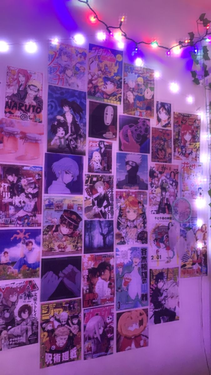 a wall covered in anime posters and lights