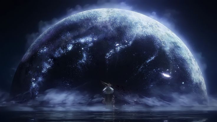 a man standing in the water next to a giant blue ball with stars on it