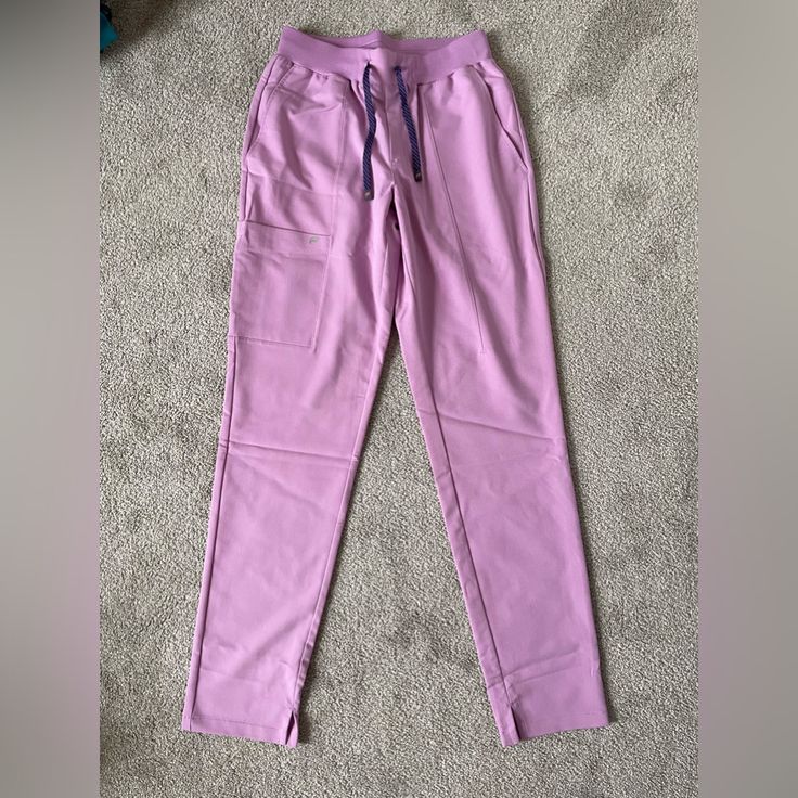 Brand New In Packaging, Never Worn. Too Big For Me And Wasn’t Able To Return. Matching Top On My Page, Bundle To Save! Scrub Pants, Matching Top, Pants Color, Scrubs, Pink Purple, Pant Jumpsuit, Lilac, Pants For Women, Packaging