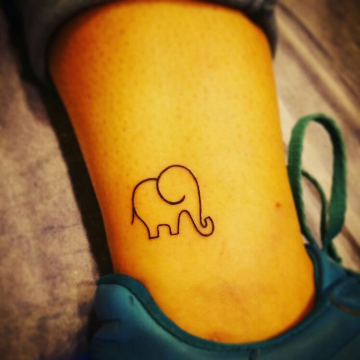 an elephant tattoo on the ankle