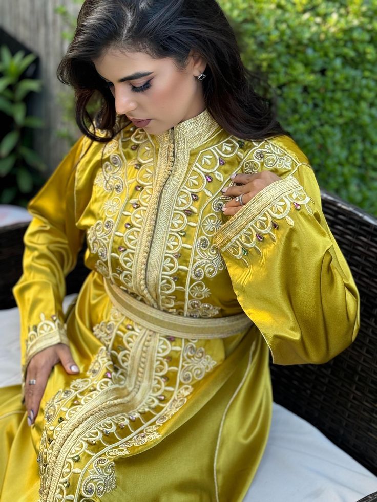 Kaftan 1 piece embroidered    Belt mdama  included    Length of the model: 160 CM   Model wears size: M / EU SIZE 38    Fabric: la soie Spring Wedding Kaftan With Dabka Work, Fitted Embroidered Kaftan For Eid, Eid Fitted Kaftan With Floral Embroidery, Fitted Floral Embroidered Kaftan For Eid, Eid Floral Embroidered Fitted Kaftan, Elegant Yellow Kaftan For Festive Occasions, Fitted Embroidered Kaftan With Traditional Drape, Embroidered Fitted Kaftan With Traditional Drape, Embroidered Kaftan For Wedding