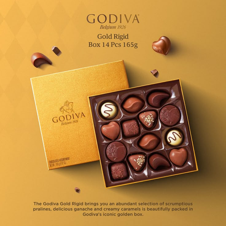 an advertisement for godiva's gold - filled box of chocolates