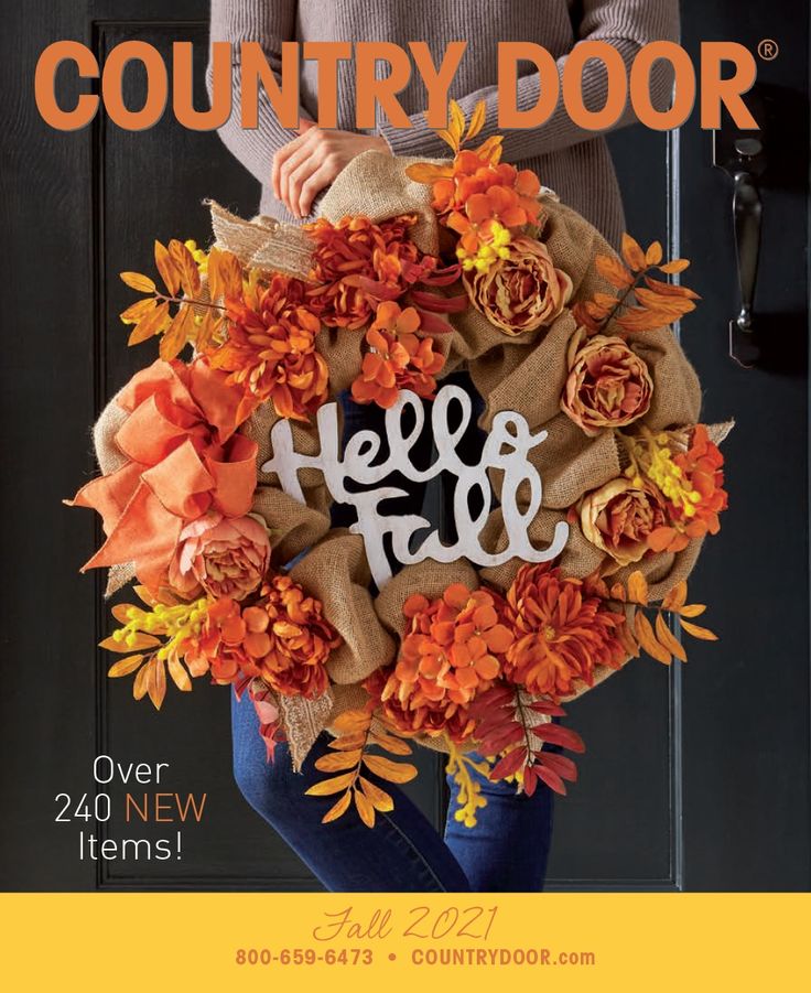 a woman holding a wreath with the words hello fall on it