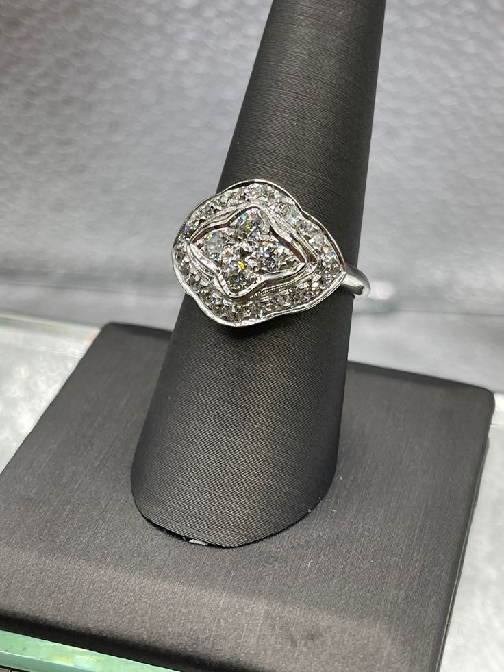 A stunning ladies antique 14 karat solid white gold 2.50 carat diamond dome cocktail ring.  A gorgeous antique ring that's truly one of a kind!   Dripping with sparkle!  This fabulous women's antique diamond ring is very special and in need of a special woman to love it. Weight:  5.1 grams Total Diamond Weight: 2.50 carats Size:  9 Our Price $3695.00 Regularly Priced At $4800.00 Please See Our Video Remember - If you're purchasing for yourself or a gift for a loved one, buy with confidence.  We White Gold Cubic Zirconia Dome Ring Fine Jewelry, Fine Jewelry White Gold Dome Ring With Cubic Zirconia, White Gold Dome Ring With Cubic Zirconia, White Gold Cubic Zirconia Dome Ring, Classic Silver Dome Ring With Single Cut Diamonds, Classic Silver Dome Ring With Diamond Accents, Elegant Silver Dome Ring With Diamond Accents, Collectible Diamond Ring With Diamond Accents, Silver Dome Ring With Diamond Accents