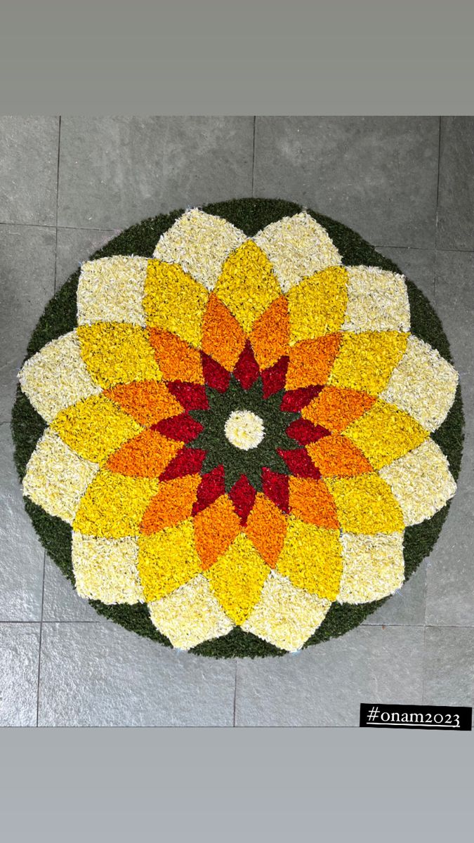 a circular flower arrangement on the floor