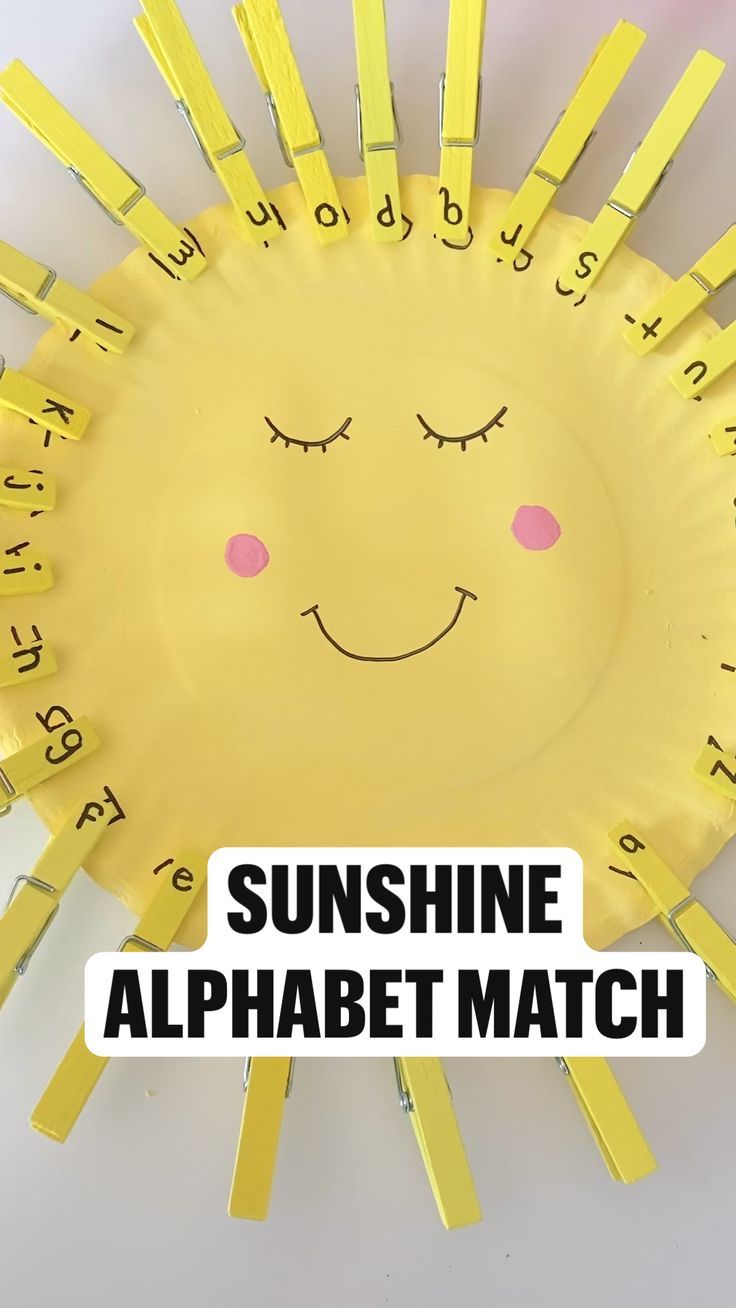 a yellow paper plate with the words sunshine on it and a smiling face drawn on it