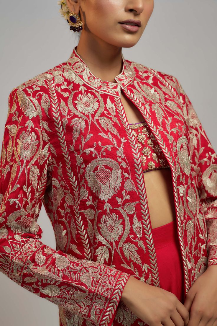 Editor's Note This smart, chic blazer features jaal work—a compelling silhouette from our collection designed for the free-spirited, bold, and adventurous woman in you. Designer Festive Blazer For Workwear, Spring Festive Fitted Bandhgala, Elegant Bandhgala For Spring Festive, Elegant Spring Festive Bandhgala, Elegant Spring Bandhgala For Festive Occasions, Elegant Festive Bandhgala For Spring, Designer Sets For Spring, Chic Formal Blazer For Festive Occasions, Festive Chic Fitted Outerwear