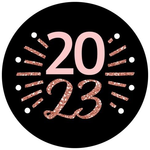 a black and pink birthday badge with the number twenty