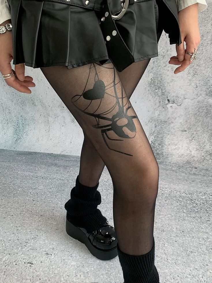 Elevate your fashion game with our spider print black summer asymmetrical tights. These unique tights feature a striking spider design that adds a touch of edgy sophistication to any outfit. Crafted from lightweight, breathable fabric, they are perfect for warm summer days and nights. The asymmetrical cut adds a modern twist, ensuring you stand out from the crowd. Black Punk Legwear For Cosplay, Trendy Black Legwear For Alternative Fashion, Trendy Black Tights For Alternative Fashion, Black Gothic Legwear For Cosplay, Black Stretch Tights For Summer, Fitted Black Tights For Halloween, Black Stretch Tights For Cosplay, Black Thigh High Tights In Grunge Style, Black Edgy Legwear For Alternative Fashion