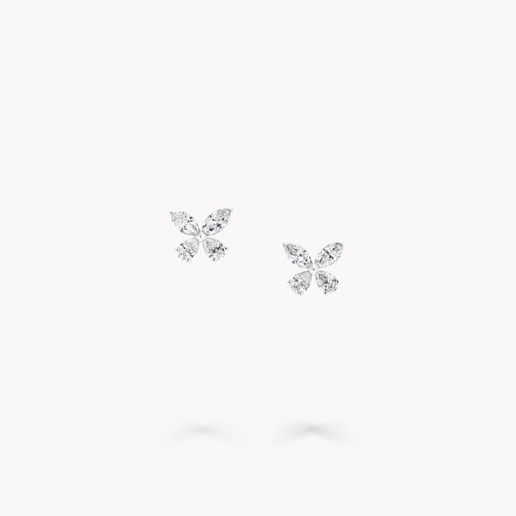 Crafted to bring a touch of brilliance to your every day, this pair of Classic Butterfly petite diamond stud earrings in white gold are set with pear shape and marquise stones. Beautifully embodying transformation, jewels from the Butterfly collection are precious talismans reminding the wearer of their strength, freedom and opportunity to fly. A dainty pair of Classic Butterfly diamond small stud earrings with a total approximate weight of 0.43 carats. Graff Butterfly, Butterfly Diamond Ring, Diamond Shaped Engagement Ring, Butterfly Chandeliers, Graff Diamonds, Diamond Drop Pendant, Diamond Drop Necklace, Mini Bracelet, Butterfly Collection