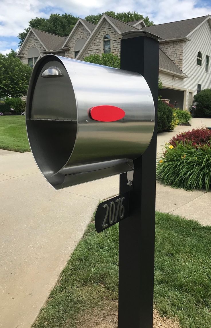 Aluminum post with matte black powder coat finish for superior durability. Stainless fasteners included to work exclusively with Spira Post mailboxes. Size is 5" x 5" x 79.5" length. Order stainless steel cap separately. Designed and manufactured in the U.S.A. Spira Mailbox Black Aluminum Mount Mailbox Post Stainless Steel | SPA-P001BLK Mailbox Black, Mailbox Landscaping, Unique Mailboxes, Mailbox Address, Mailbox Accessories, Post Cover, Mailbox Posts, Mailbox Decor, Mailbox Post