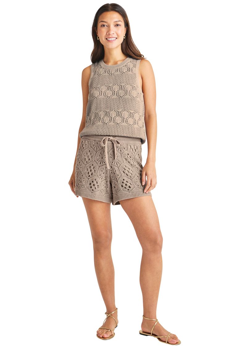 Pretty pointelle stitching patterns this sweater knit from soft cotton yarns and designed without sleeves for cool comfort in the season's warmth. Crewneck Sleeveless 100% cotton Machine wash, dry flat Imported Casual Summer Cable Knit Top, Casual Beige Cotton Sweater Vest, Casual Sleeveless Sweater Vest For Loungewear, Summer Sleeveless Sweater Vest For Loungewear, Sleeveless Sweater Vest For Summer Loungewear, Cotton Sleeveless Tank Top, Spring Cotton Knit Tank Top, Cotton Knit Tank Top For Spring, Summer Cotton Knit Sweater