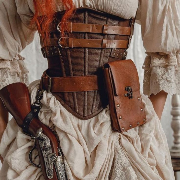 woman wearing a small steampunk bag Modern Steampunk Fashion Women, Alchemist Clothes, Steampunk Apron, Steampunk Dystopia, Steampunk Fashion Everyday, Steampunk Carnival, Steampunk Cottagecore, Modern Steampunk Fashion, Victorian Steampunk Aesthetic