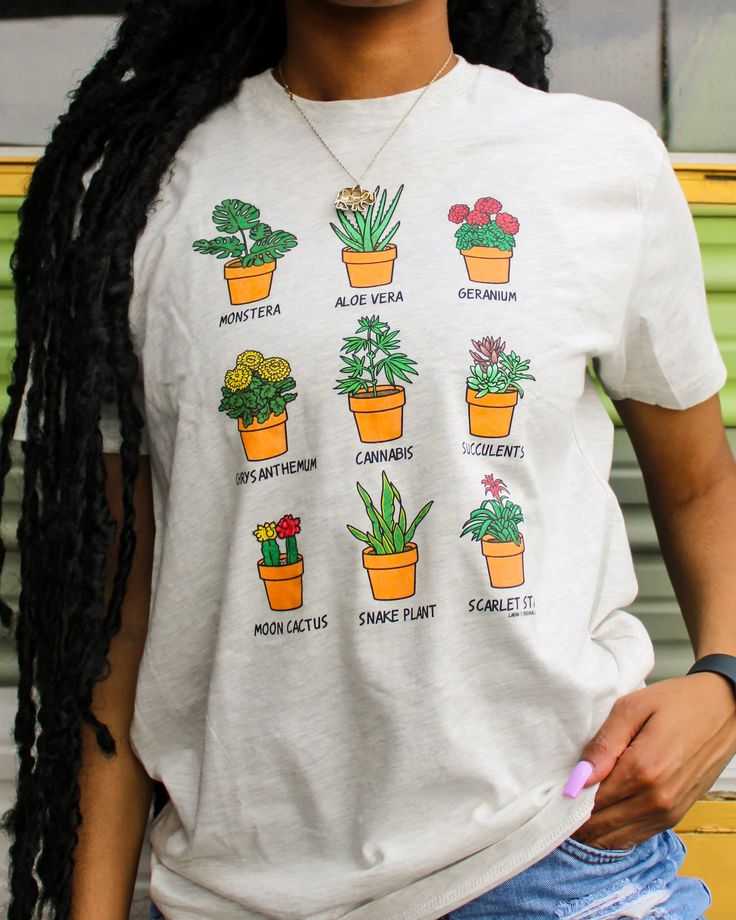 Support plant parenthood 🌱🌷🍃 Model is wearing size medium. This shirt is unisex and printed direct-to-garment on 100% cotton. To help preserve the vibrant colors, turn inside out before washing and dry on low heat. Eco-friendly Green Cotton T-shirt, Botanical Plants Print Relaxed Fit T-shirt, Organic Cotton Crew Neck T-shirt, Sustainable Cotton Tops With Screen Print, Casual Tops With Earth Day Screen Print, Casual Screen Print Tops For Earth Day, Casual Earth Day Screen Print T-shirt, Casual Earth Day T-shirt With Screen Print, Eco-friendly Cotton Top With Graphic Print