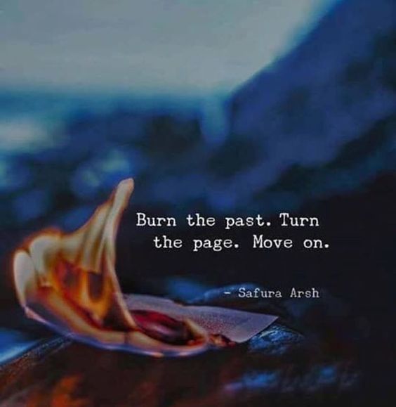 a piece of paper sitting on top of a wooden table next to a quote that reads burn the past turn the pages move on