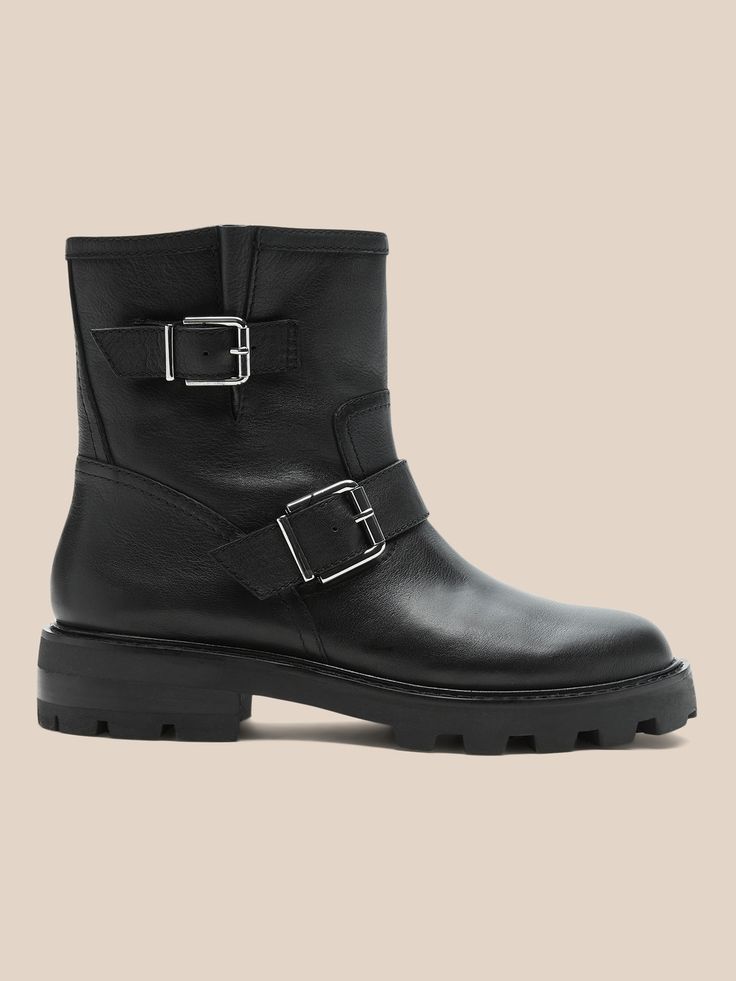 Ready for adventure, these biker boots bring classic moto styling in a slightly-slouchy silhouette that adds a little edge to even the most done-up looks.  Leather uppers.  Leather lining.  Buckle closure, slip-on styling.  Flexible skid-resistant lu Rugged Moto Boots With Reinforced Toe For Winter, Rugged Moto Boots With Reinforced Toe Ankle Boot, Rugged Moto Boots With Reinforced Toe, Rugged Moto Boots With Leather Footbed For Winter, Rugged Moto Boots For Fall Outdoor Activities, Rugged Moto Boots For Fall Outdoor, Moto Boots For Outdoor Fall Season, Winter Moto Boots For Outdoor, Edgy Ankle Moto Boots For Outdoor