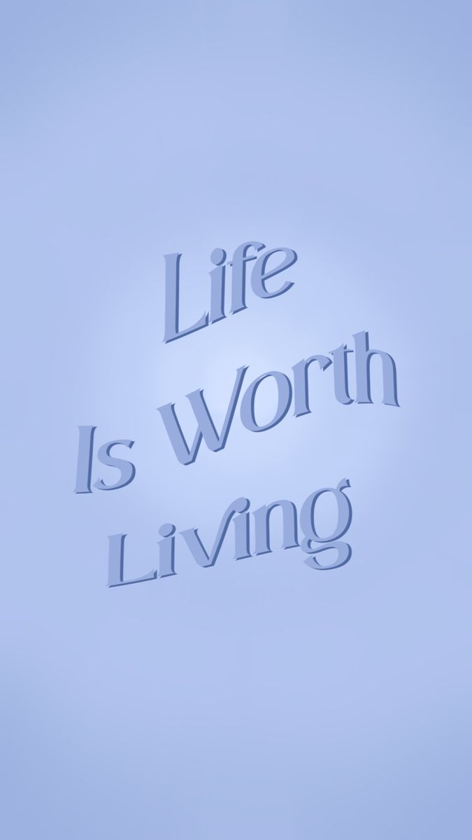 the words life is worth living against a blue sky